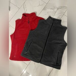 2 Columbia women’s XL fleece vests. Really nice condition. Red and dark grey.